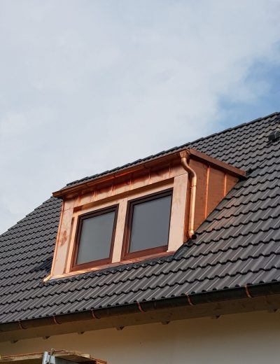 Passgenaue Gaubenverblechung zum Schutz vor Feuchtigkeit